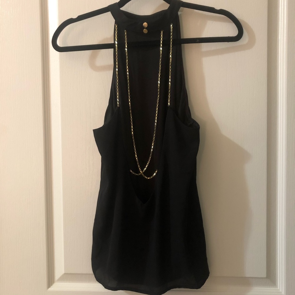 Black flowy top with beautiful back cut out